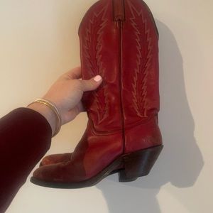Cute red cowgirl boots. Not sure of the brand